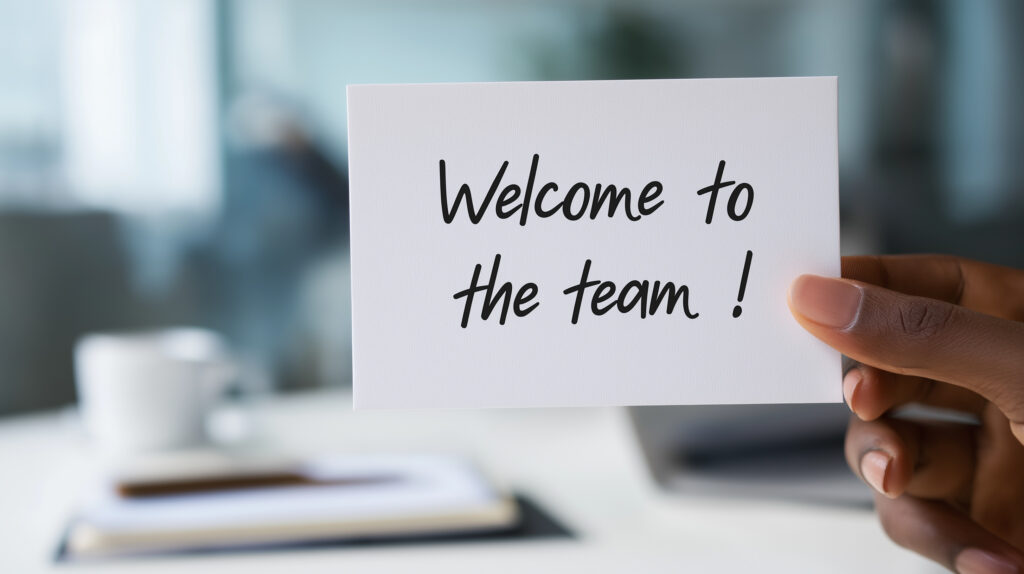 human resources department welcoming new employee to corporate team, offering warm greeting card, celebrating successful hiring and onboarding process in office workplace